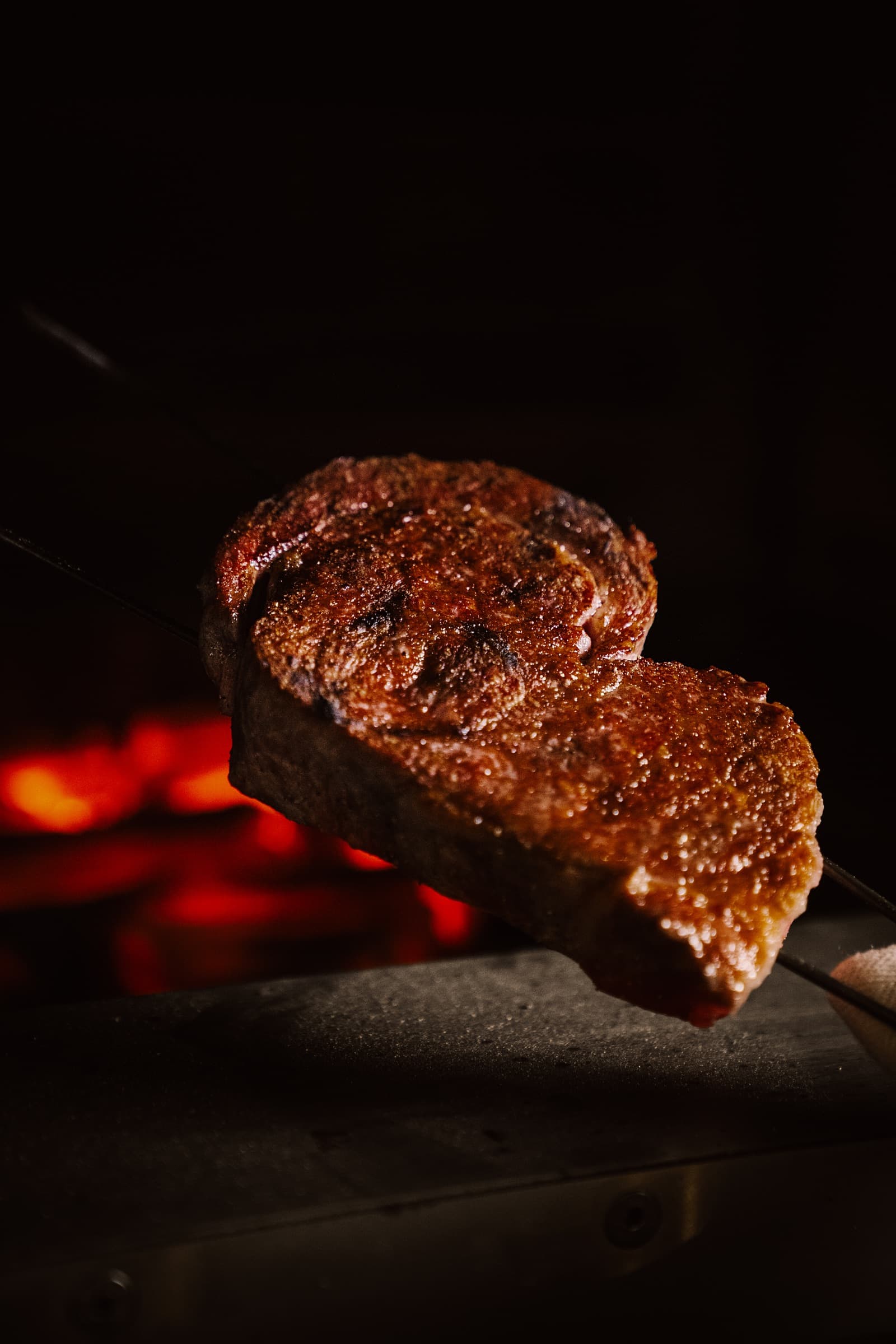 Tajima Wagyu cooking over Binchotan charcoal at Aragawa